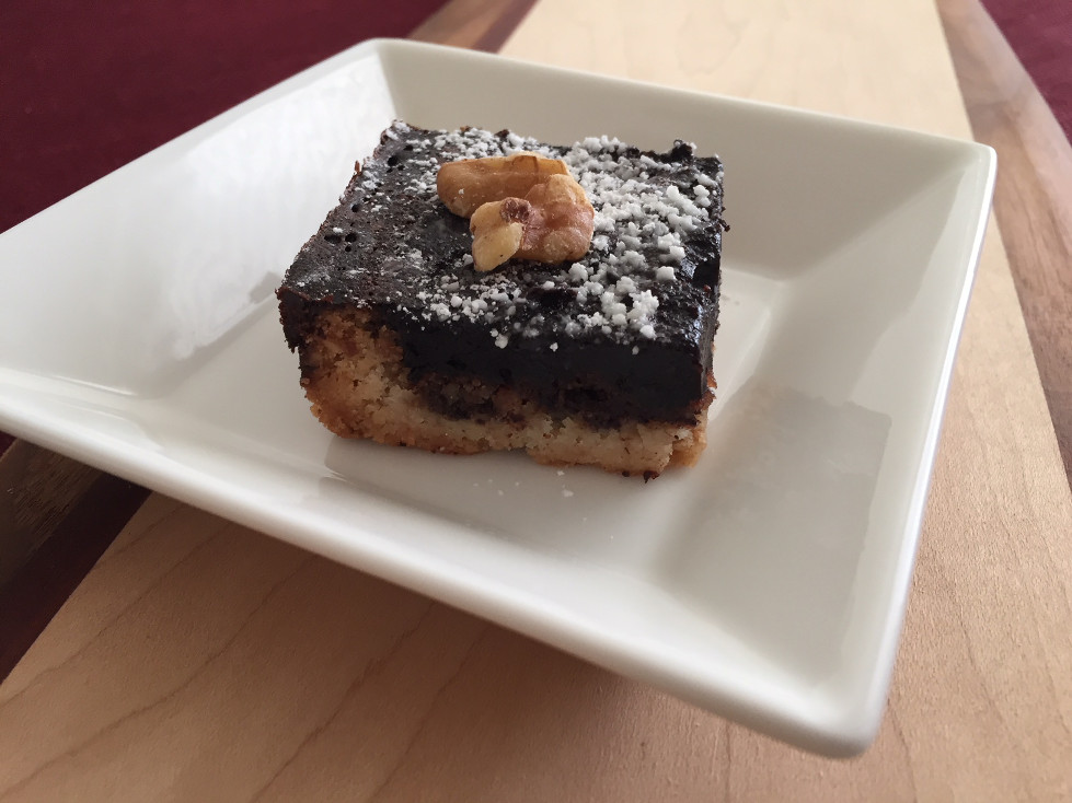 Final bar with a walnut topping on a white dish Walnut Dessert Recipe Chocolate Walnut Bars Baking Those Someday Goals