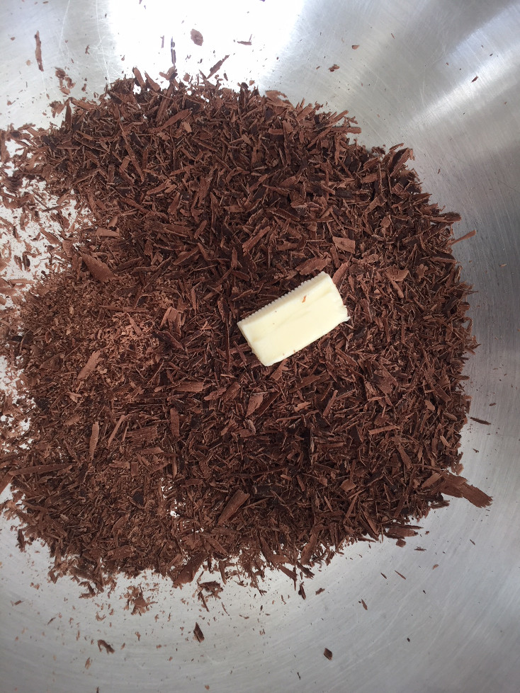 Adding butter to the Microplane Belgian Chocolate Shaved Belgian Chocolate easy chocolate truffles recipe Those Someday Goals
