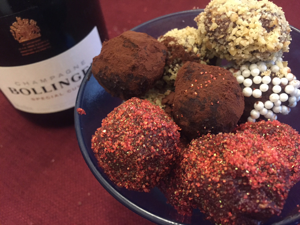 Vanilla extract chocolate truffles in blue dish by bottle of Bollinger Champagne Easy Chocolate Truffles Recipe Those Someday Goals Valentine's Day dessert ideas