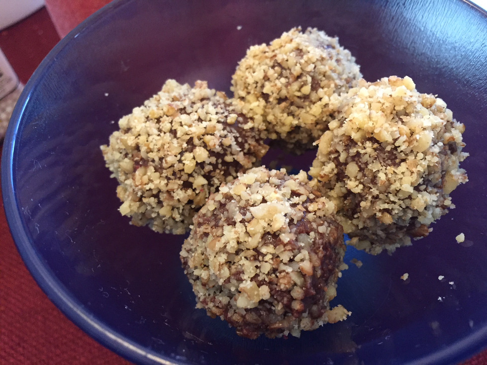 Walnut covered chocolate truffles in a blue dish Valentine's Day dessert ideas Easy chocolate truffles recipe those someday goals