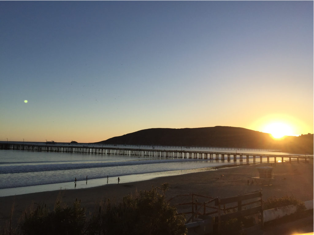 Sun setting over mountains Avila Beach California Pictures Those Someday Goals