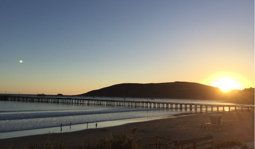 Sun setting over mountains Avila Beach California Pictures Those Someday Goals