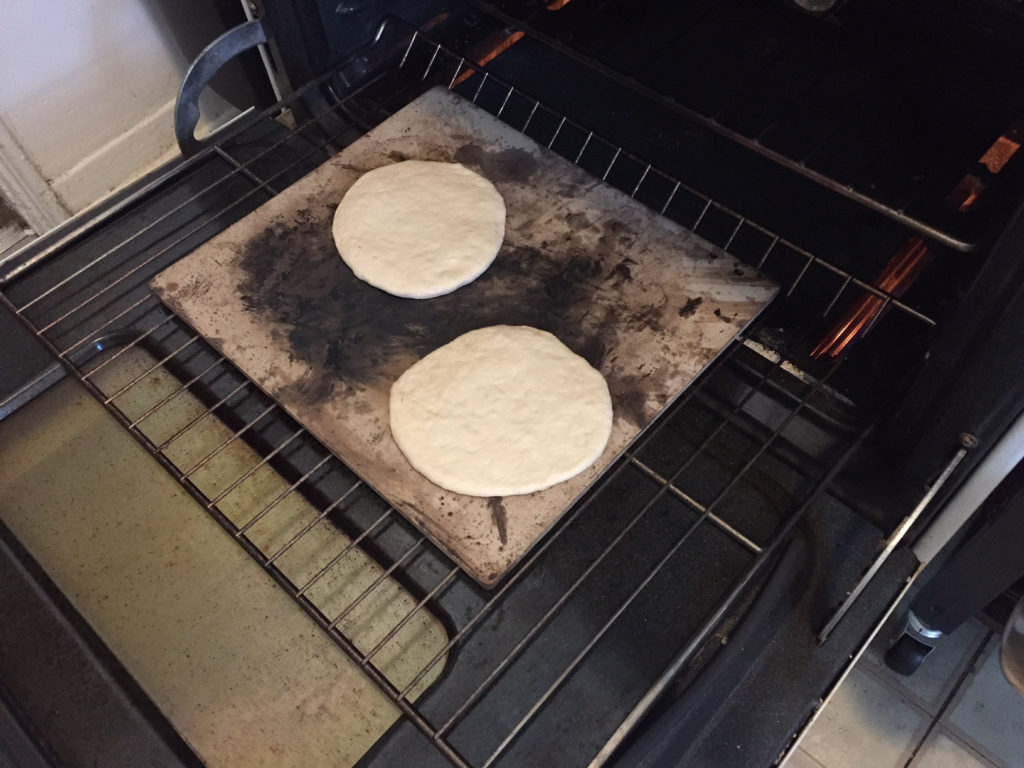 Baking the pita on a stone in the oven Homemade Pita Bread Recipe Those Someday Goals