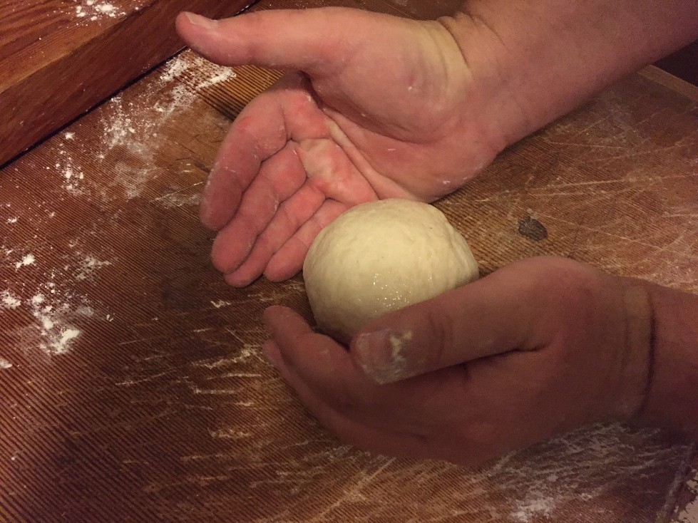 Shaping the individual pita dough balls Homemade Pita Bread Recipe Those Someday Goals