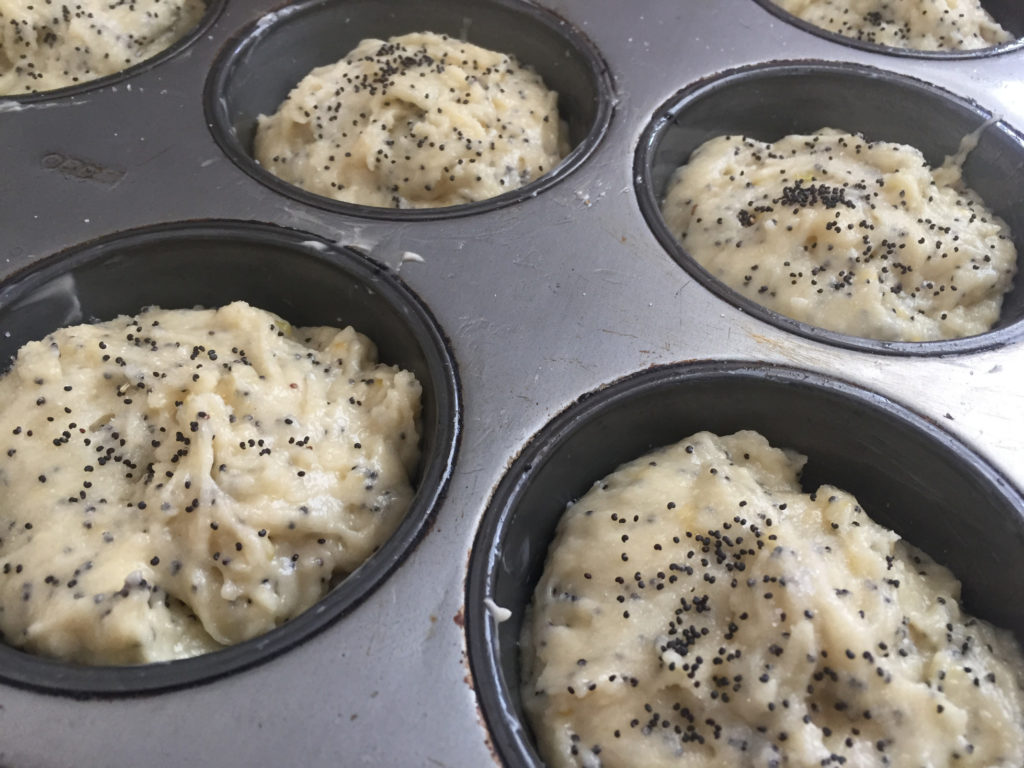 ready to bake in standard 12 muffin tin Adding wet ingredients to dry Lemon Poppy Seed Muffins baking Those Someday Goals
