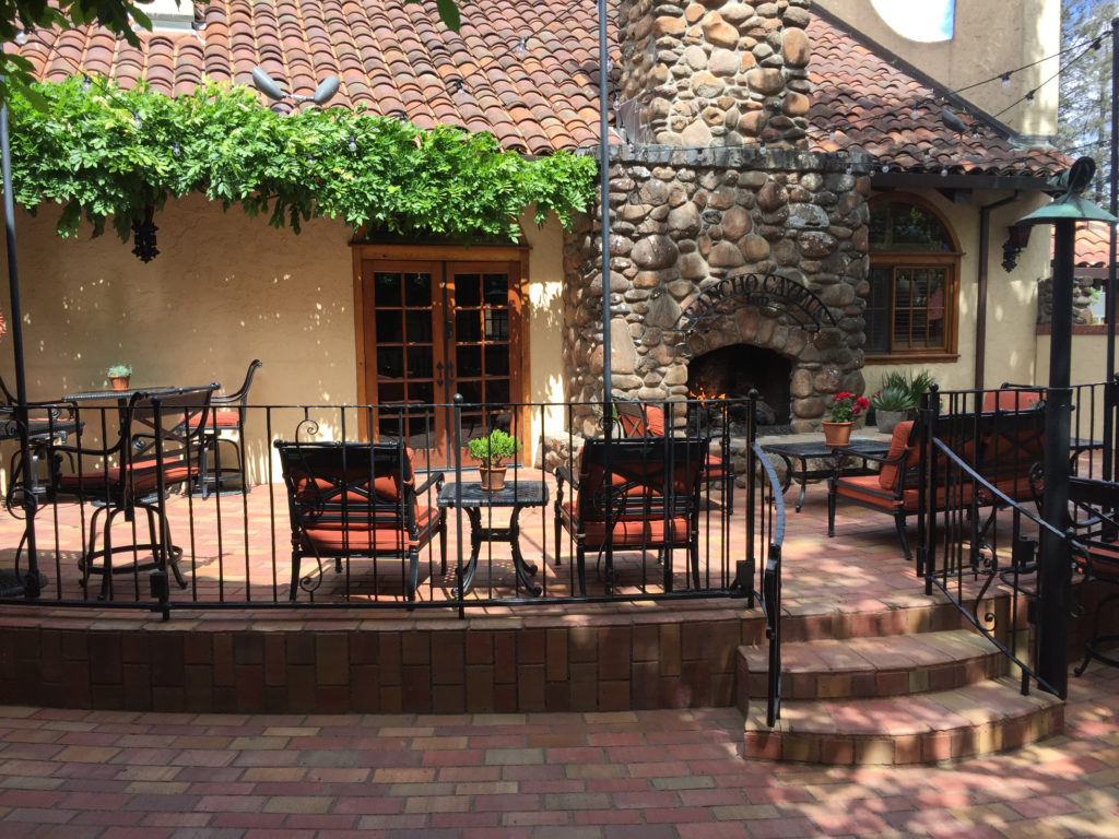 outdoor fireplace and chairs Rancho Caymus Inn Napa Valley Hotel Rutherford California Those Someday Goals