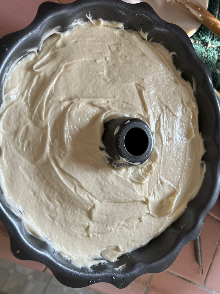 Smoothing batter into the bundt cake pan bundt cake recipe baking Those Someday Goals
