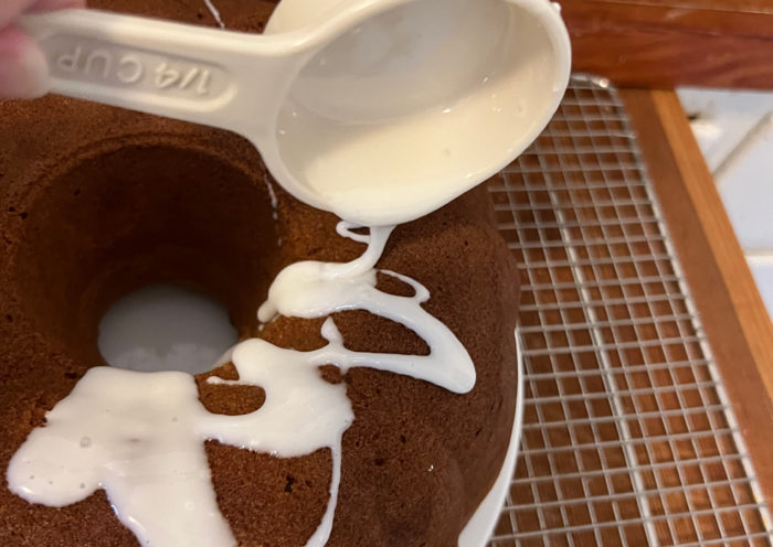 Pouring on the glaze bundt cake recipe baking Those Someday Goals