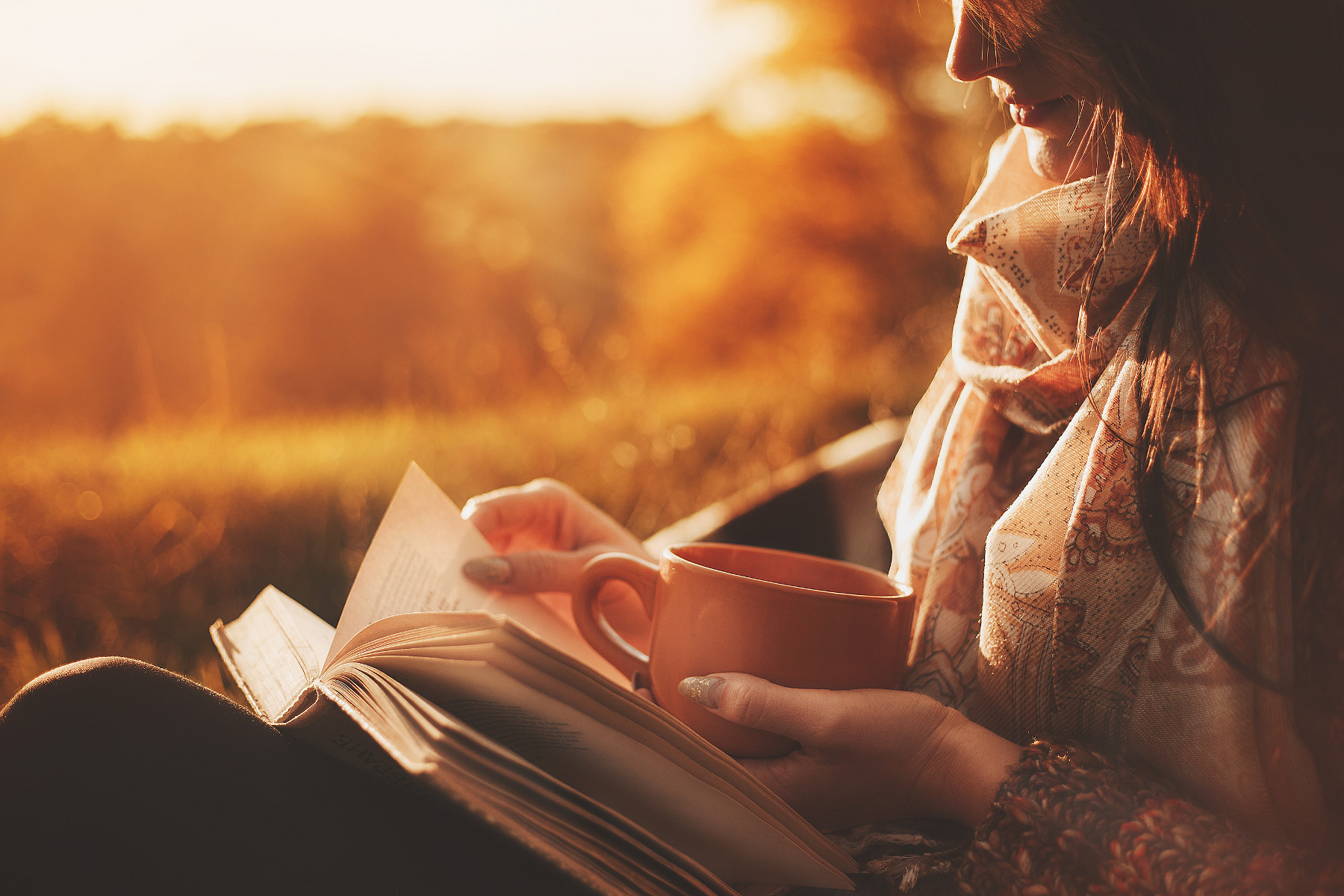 Autumn Woman Reading Book Sun Setting Mug in hand Shutterstock LOGVINYUK YULIIA Those Someday Goals