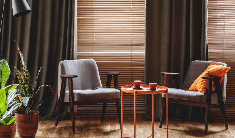 cozy home decor dark curtains two chairs orange table plants and dark light Those Someday Goals