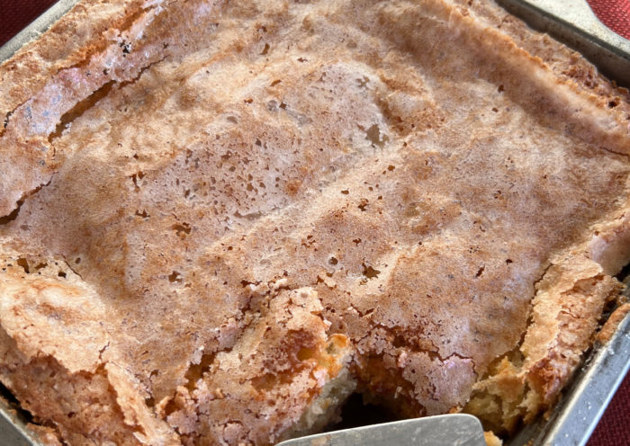 Cooled and sliced apple cobbler in a pan with napkin Holiday Dessert Apple Cobbler Those Someday Goals