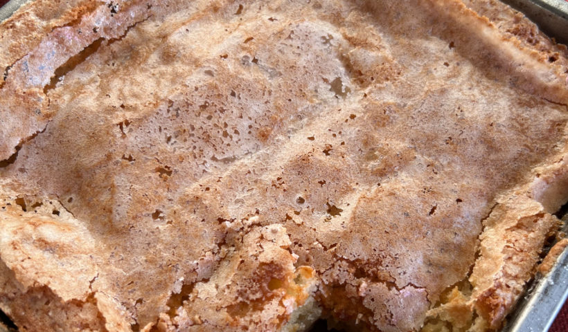 Cooled and sliced apple cobbler in a pan with napkin Holiday Dessert Apple Cobbler Those Someday Goals