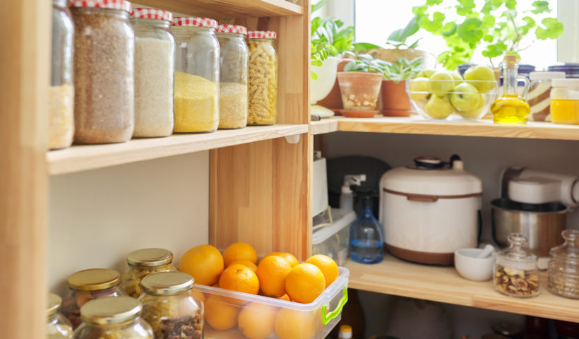 Organized pantry shelves reorganize a pantry fruit jars appliances shutterstock Those Someday Goals