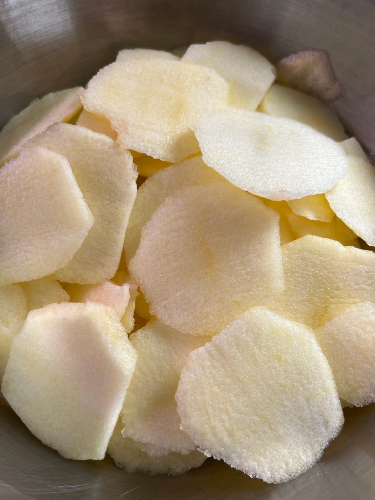 Sliced apples in a bowl Holiday Dessert Apple Cobbler Those Someday Goals