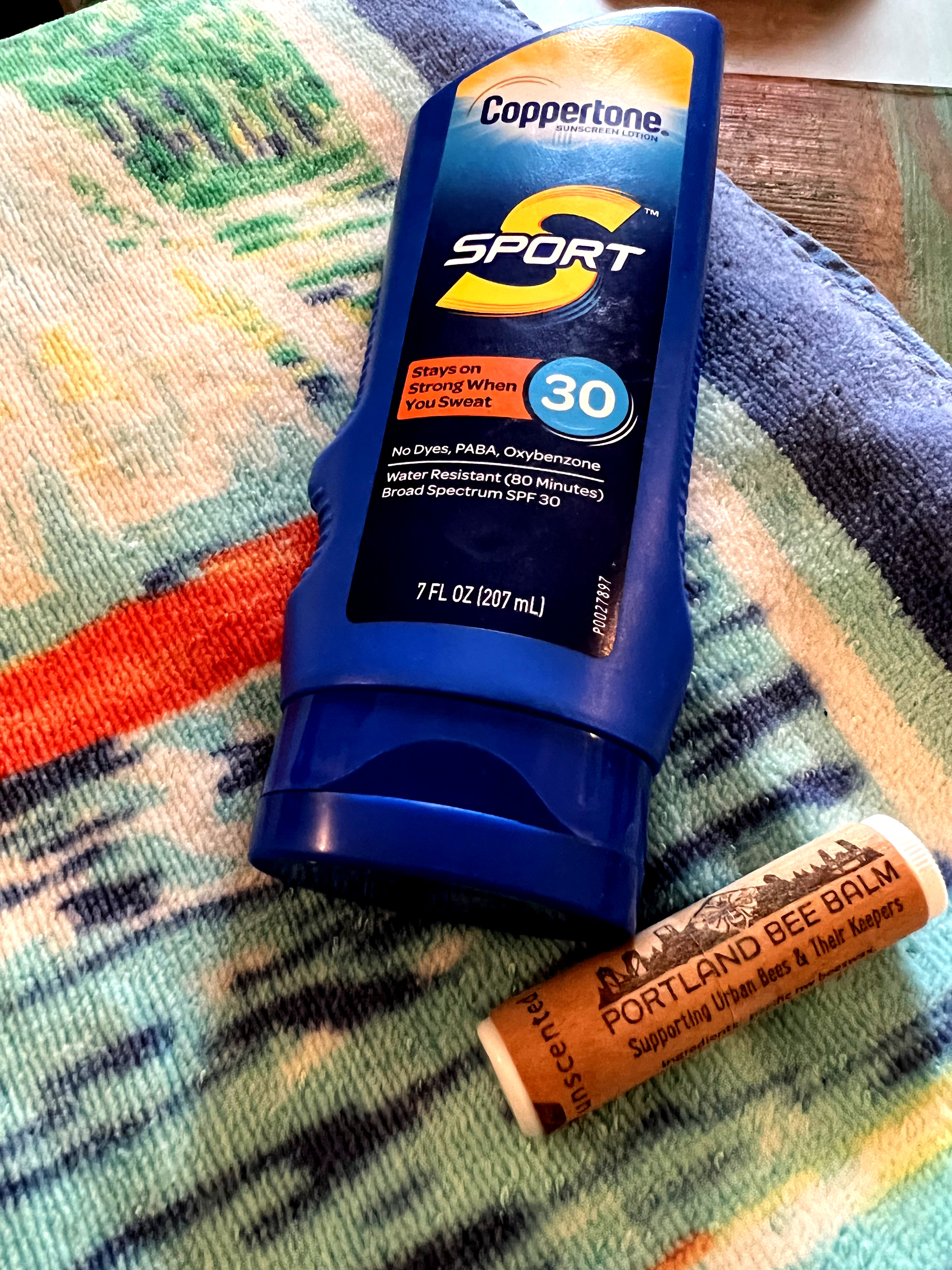 Decluttering challenge beach towels sunscreen Portland bee balm organization tips Those Someday Goals