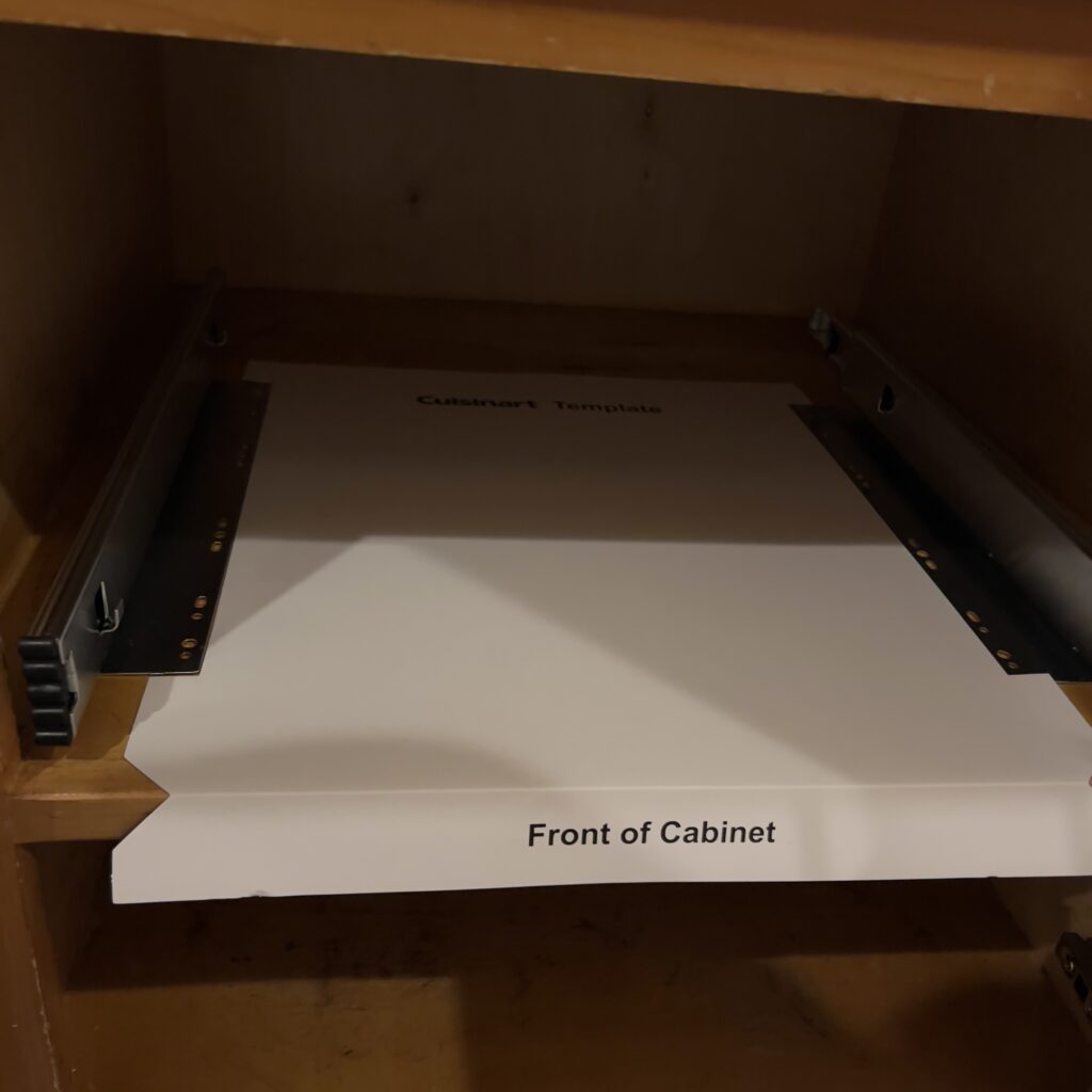 Slider cabinet organizer paper template with mounts lined up along side of it for cheap kitchen remodel those someday goals