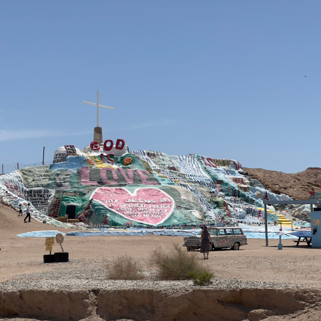 Salvation Mountain art installation view from the parking lot Travel Those Someday Goals Art by Leonard C Knight