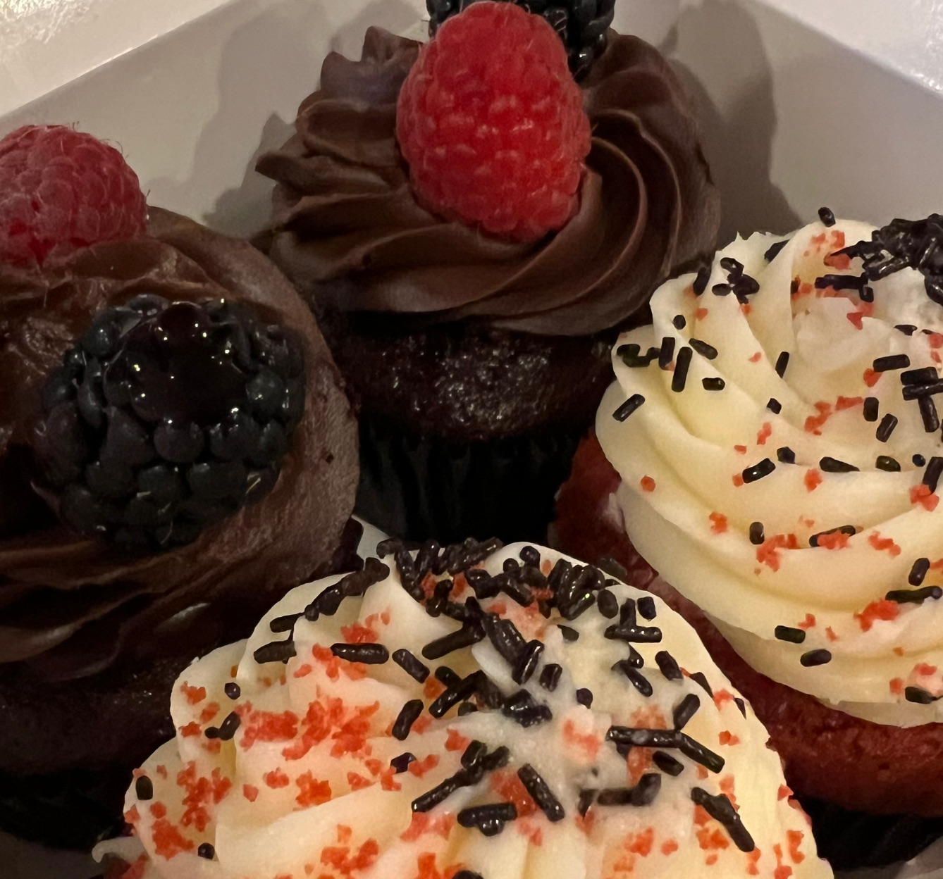 Chocolate and red velvet cupcakes from Sinners & Saints Food and Drink Those Someday Goals
