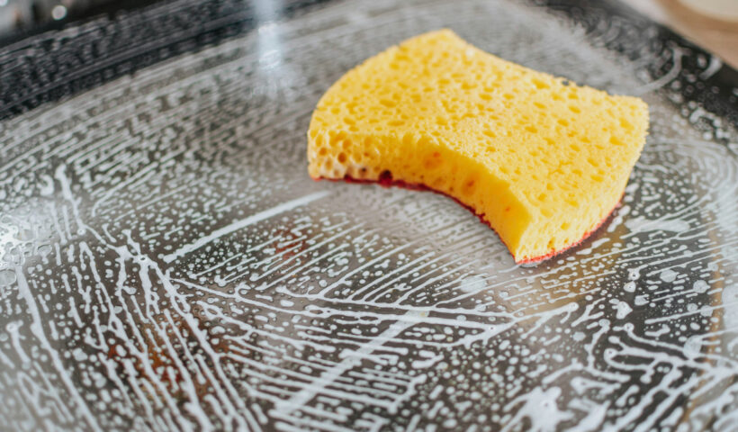Fall Cleaning with a yellow sponge on metal table Those Someday Goals Photo credit: pille-r-priske-Y1JjwhHaPRM-unsplash